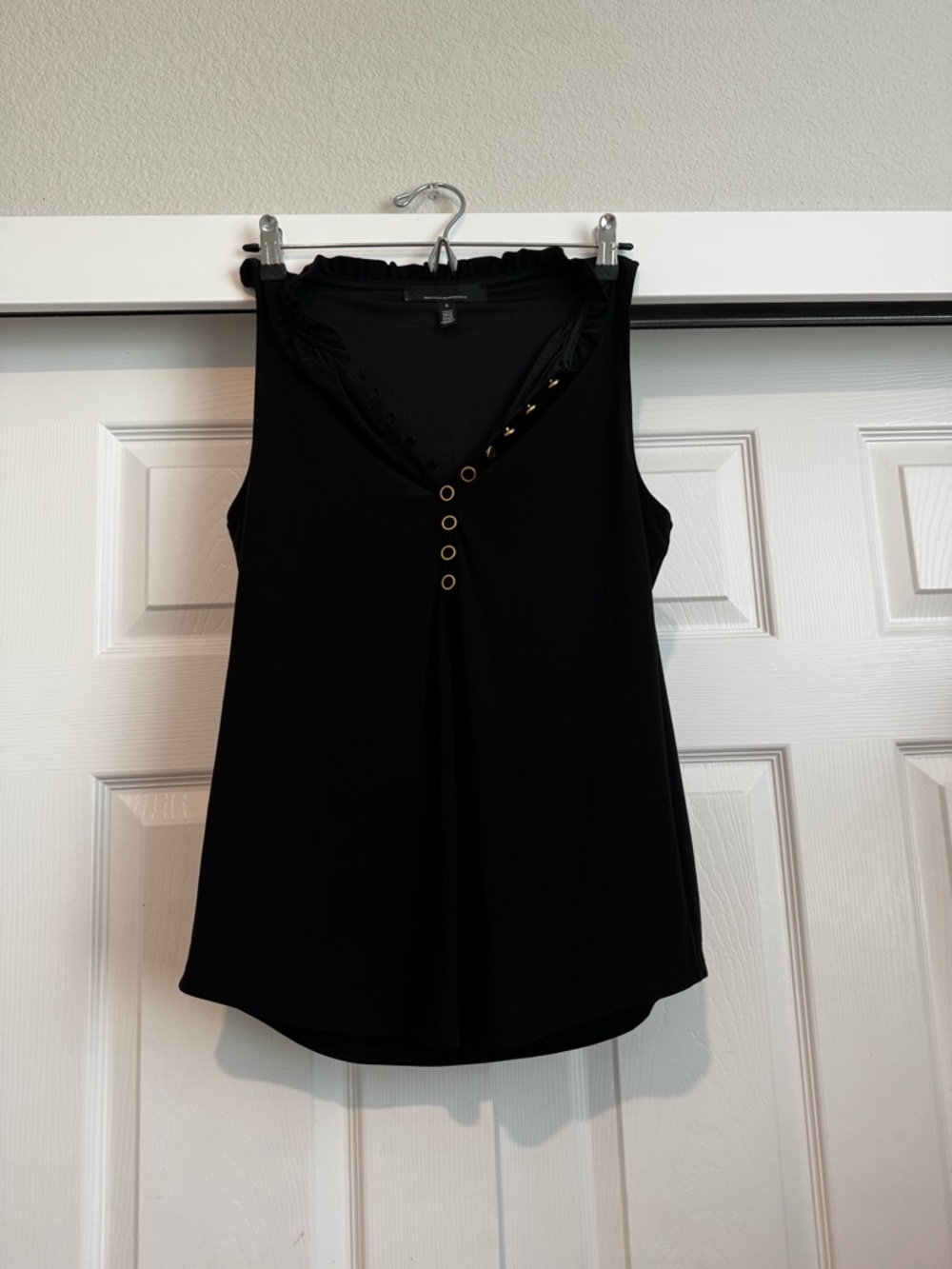White House Black Market Black V-Neck Blouse with Gold Eyelet Detail
